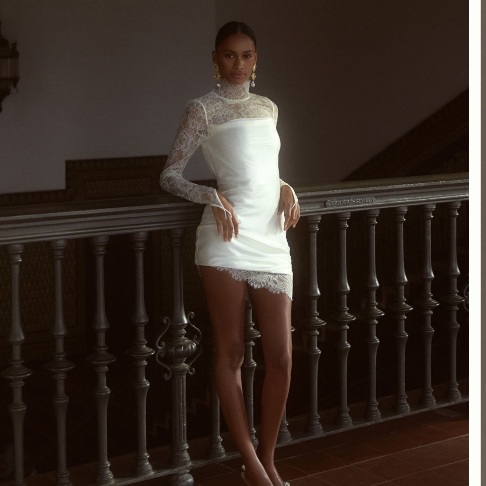 De La Vali Croissant Long-sleeve lace mini dress in Ivory; size 2